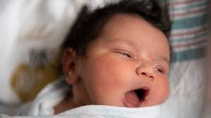 Joyful start to 2021: Grand Rapids parents cuddle new babies