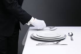 Donning a black suit and white gloves,. Catering Gloves That Work And Still Look Great The Glove Guru