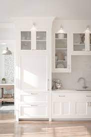 White Shaker Kitchen Cabinets With A Custom Matching Fridge Built In Refrigerator Kitchen Remodel Home