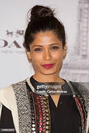 Model Karlie Kloss President of Coach International Ian Bickley,... News  Photo