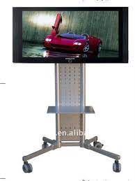 Has a convenient tray for holding remotes and other items. High Quality Metal Outdoor Tv Stand Tv Ao Ar Livre Suporte De Tv Com Rodas Tv Na Parede