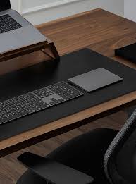 Desk pads are made of plastic or rhinolin and offer a smooth surface that makes writing easier than working directly off a desk. Leather Desk Pad Ergonofis Online Only Accent Furniture Simons