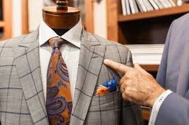 Beautiful single breasted, hand pick stitching around the collar and packet flap, 4 pockets outside 2 pockets. Dressing Well Is Always Good Business Savile Row Custom Clothiers St Louis Mo