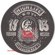 Anyone know a font similar to either/both of the fonts used in miller high life logo? Miller High Life Harley Davidson Beer Coaster