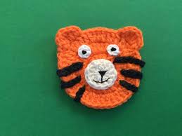White tigers live, crawl and relax in knitted texture. Crochet Pattern For Tiger Applique Kerri S Crochet