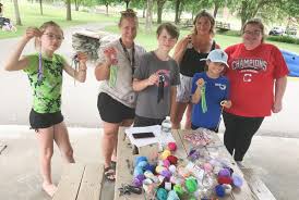 Kids make dream catchers as part of summer program in Rome