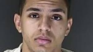 Former airman sentenced to 18 years in prison for role in 2018 drug heist  slaying