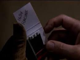 What movie features the address 1634 Racine and who lives there?