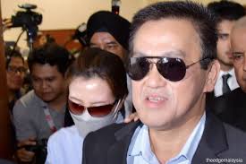 KK Mart founder, wife and supplier charged with wounding religious feelings  over 'Allah' socks issue; plead not guilty