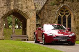 Image result for Magma Red 2012 Aston Martin