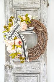 Hang this lovely floral wreath on your front door to usher in guests or set it atop the mantel for a festive focal point. Summer Front Door Wreath Diy Stonegable