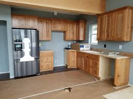 Sherwin Williams Gris With Natural Rustic Cherry Cabinets Natural Douglas Fir Beam And Engineered Hardwood Flooring Samsung Frenc Rustic Cherry Cabinets Engineered Hardwood Flooring Cherry Cabinets