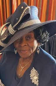 My husband, Rev William Lanier Pullam, (age 73) sitting in his Pastor's  Church office. His Mother, Mrs. Arlena Pullam stands at his side. She's 93  years old, born in the 1920's, have
