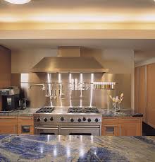 kitchens with stainless steel backsplashes
