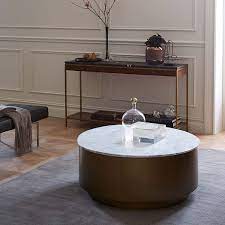 Available in several styles, these wooden, metal, and leather coffee tables will. Marble Metal Drum Coffee Table