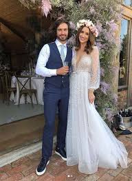 From the dress to the from the classic ivanka trump to the modern jessica biel, here are our favourite bouquets to. How To Get Celebrity Inspired Wedding Flowers Like Meghan Markle And Miley Cyrus On A Budget Hello