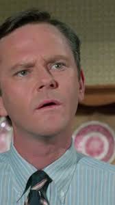 Endora (Agnes Moorehead) splits Darrin (Dick Sargent) into two halves so  one can go to Tokyo