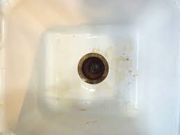 cleaning an older porcelain sink