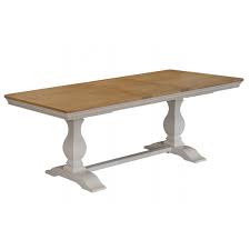 The legs of the table are curved and sits on top of a pedestal. Wellington Large Extending Dining Table 1800 2300