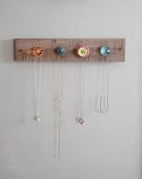 I just measured across, cut it with tin snips, marked equal distances on either side of the frame, and stapled them in. 24 Diy Necklace Holder Ideas To Spark Your Imagination