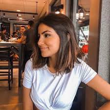 The girl gives a cool pose in her shoulder length dark brown hair. Finding The Right Medium Brown Hair Styles Human Hair Exim