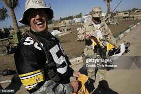 Cpt. Lyle Gardner of Boswell, Pennsylvania laughs while Sgt. 1st... News  Photo