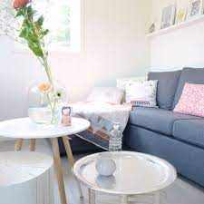 Generally the rule is that your coffee table should be the same height as your couch's seat (give or take one to two inches, but not any lower). Turning The Tables The Advantage Of Having Two Or More Coffee Tables By France Son Medium