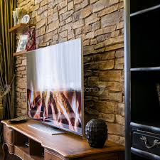 Beneath the colorful, swirling leaves, you will see solid stone buildings and farm walls. Stone Wall Covering Sillarejo Artstone Home Commercial Textured
