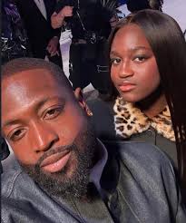 Dwade and daughter Zaya Wade pose at the Out100 event.