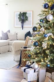 Blue And Green Decorating Christmas Tree And White Sofa With Blue And Green Pillows Blue Christmas Tree Decorations Blue Christmas Decor Blue Christmas Tree