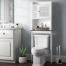 If you can swing it, recessed shelving behind the toilet is a great idea. Over The Toilet Storage Wayfair
