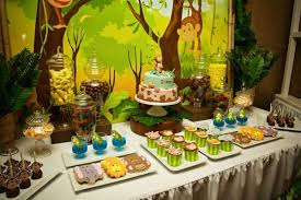 A safari themed baby shower with burlap + bamboo + with animal patterns. Monkey Party Ideas Collection Moms Munchkins Lion King Baby Shower Baby Shower Table Decorations Monkey Baby Shower