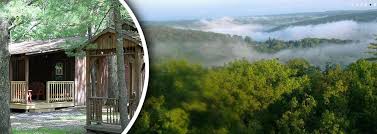 Recreational activities include playground, hot tub and play area with horseshoes and badminton. Top Hill Cabins Cook Forest Pa