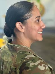 Congratulations, Lillian Butler! Lt. Col. John Moran, 554th Engineer  Battalion commander, visited Rolla Junior High School to award Lillian with  the Leadership Award for representing the Army Value of Duty. Well done,