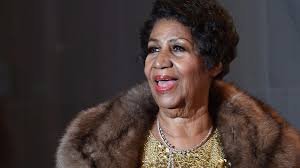 Aretha Franklin's body arrives in gold-plated casket to lie in state