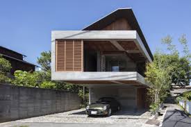 Tato architects designed the dwelling with a simple corrugated metal exterior and an angled roof. How Does A Modern Japanese House Look Like 6 Interesting Design Ideas