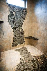 Perfect to be placed outdoors, it is a natural bathtub that reminds of riverside stones with rounded edges. New Construction Goes Green Rock Shower Pebble Shower Floor River Rock Shower