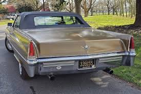 Image result for Medium Gold 1969 Cadillac