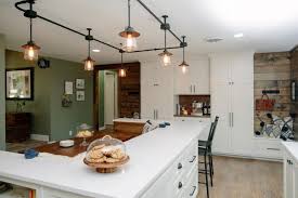 A power supply attached to a junction box or a power cord from the track to a standard electrical recommended to you. Industrial Track Lighting Over Eat In Dining Area In Open Country Kitchen Hgtv