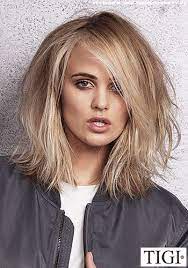 Frisuren Bilder Blond Gestrahnter Long Bob Mit Schonem Volumen Im Gesamten Haar Frisuren Haare Frisuren Bilder Haar Styling Frisuren