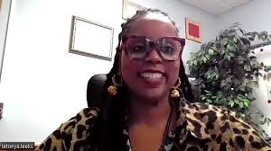 Elementary school principal shares excitement over jumping out of plane