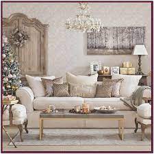 Curtains blend grays, pink and creams, while bright pink pillows add color. Beige Gold And Brown Living Room Ideas Gold Living Room Decor Silver Living Room Gold Living Room