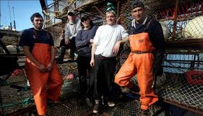 Discovery Channel UK - Kodiak crew from left to right: deckhand Melvin  Koso, a native Alaskan and a hydraulics expert; deckhand/engineer Adam  McCalden, an adrenaline junkie with a "work hard, play hard"