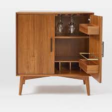 If you prefer a different approach, settle on a sectional. Mid Century Bar Cabinet Small