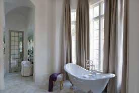 Interiors with high ceilings offer a great opportunity to express your design style in a more exuberant fashion while stealing the show with their grandeur. Master Bathroom High Ceiling Design Ideas