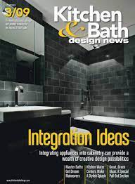 The brass mirror really stands out against the gray wallpaper while the two brown nickel and glass wall sconces tie it all together. Kitchen And Bath Cover Magazine Google Search Kitchen And Bath Design Bath Design Bathroom Design