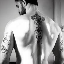 Spine tattoos often take a lot of time to finish as it is quite painful; 99 Spine Tattoo Ideas That Match Your Personality
