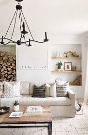 The wood floors provide warmth to the space and keep it from feeling too stark. 17 White Living Room Decor Ideas Sebring Design Build