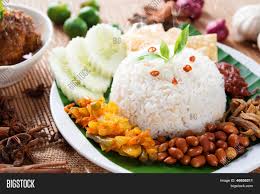 Tie the pandan leaves in a knot and add it to the rice along with salt and 1 3/4 cups water. Nasi Lemak Kukus Image Photo Free Trial Bigstock