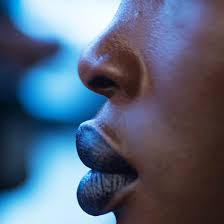 Young woman shrugging her shoulders. The Model Whose Lips Spurred Racist Comments Speaks Out The New York Times